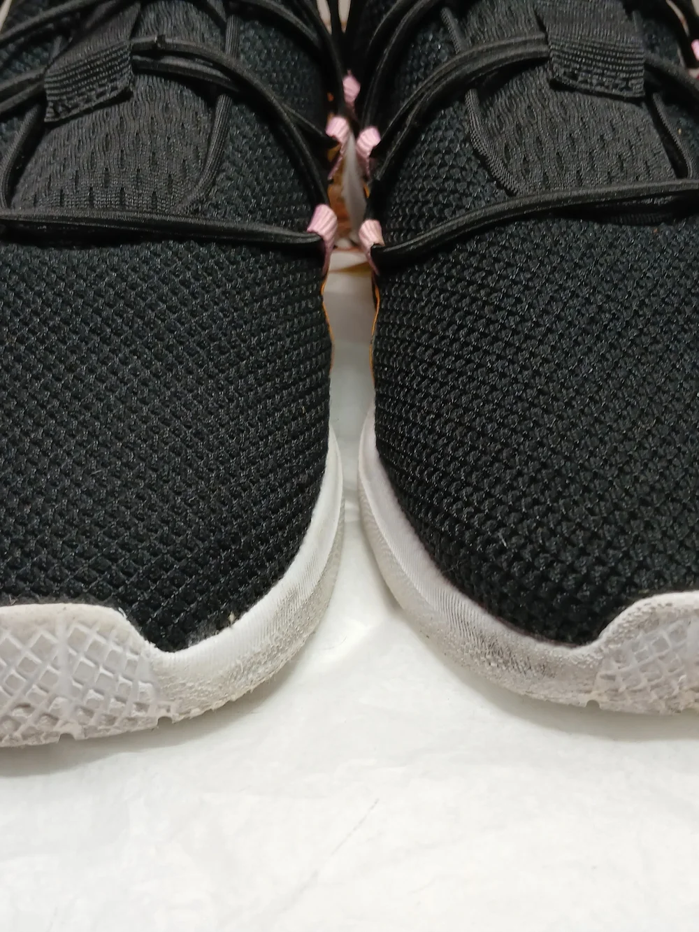 Puma Black Sneakers with Pink Accents and Orange Trim
